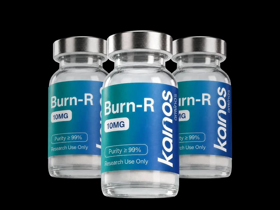 Three Burn-R research vials arranged on a blue podium